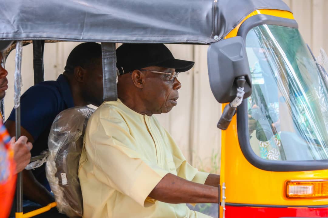 Obasanjo turns ‘commercial Tricycle rider’, urges youths on opportunities